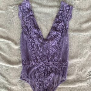 Sheer navy blue intimate bodysuit